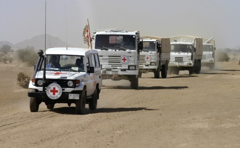 An image of Red Cross-owned vehicles with the Red Cross emblem